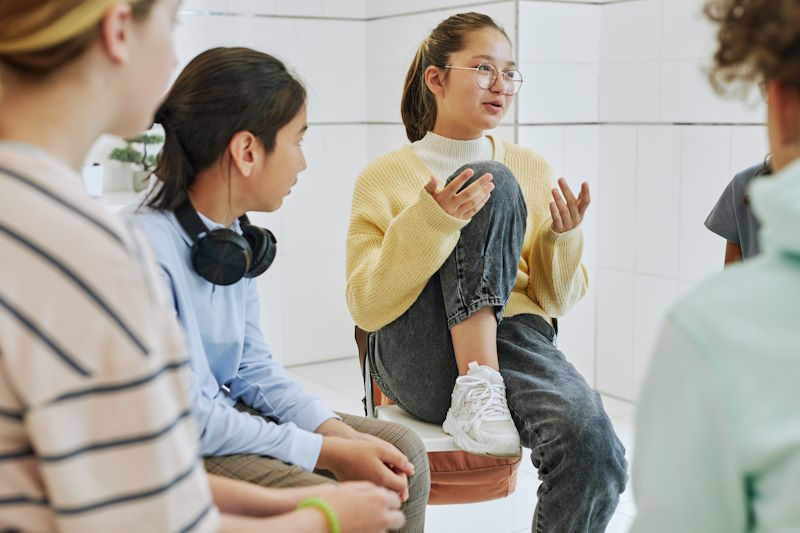 Girl Sharing in a Support Group